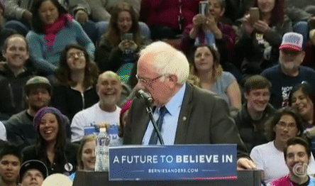 A bird lands on the lecturn while Bernie Sanders is speaking in Oregon.