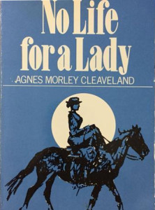 Book cover with full moon silhouetting a woman riding a horse on a side saddle.