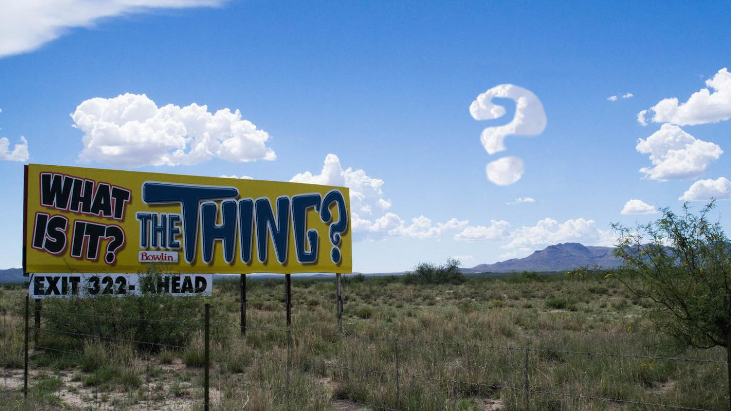 Roadside sign in Arizona desert for The Thing.